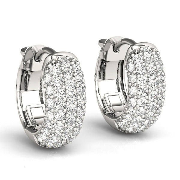 Elegant white gold hoop earrings with a textured surface encrusted with sparkling diamonds, set against a plain white background.