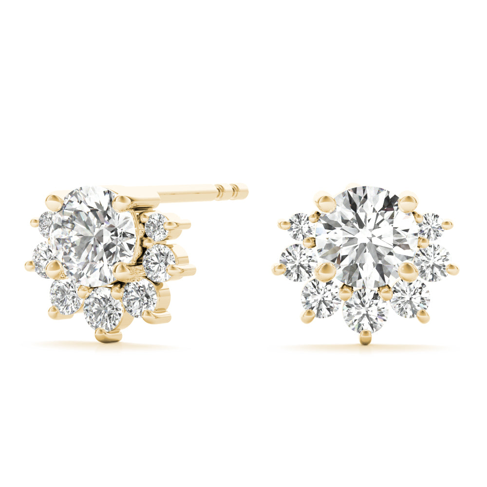 A pair of sparkling diamond stud earrings feature a cluster design with a central large gem surrounded by smaller diamonds, set in a white background.