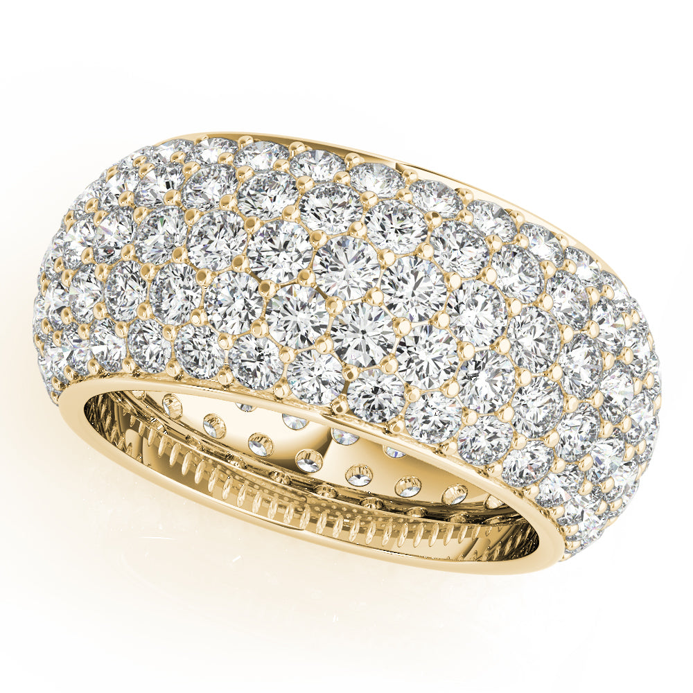 A gold ring encrusted with numerous small, sparkling diamonds, set against a soft white background, exudes elegance and luxury.