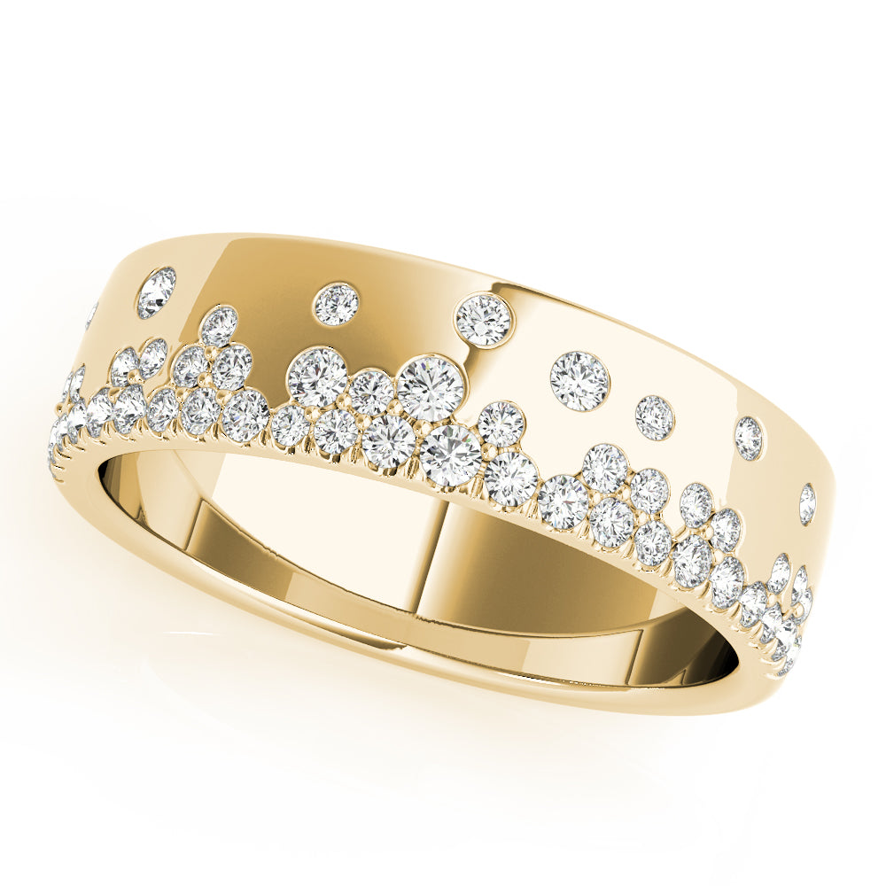 A yellow gold ring with a sleek band, featuring small, round diamonds set in scattered clusters and individually around the ring, creating a sparkling effect.