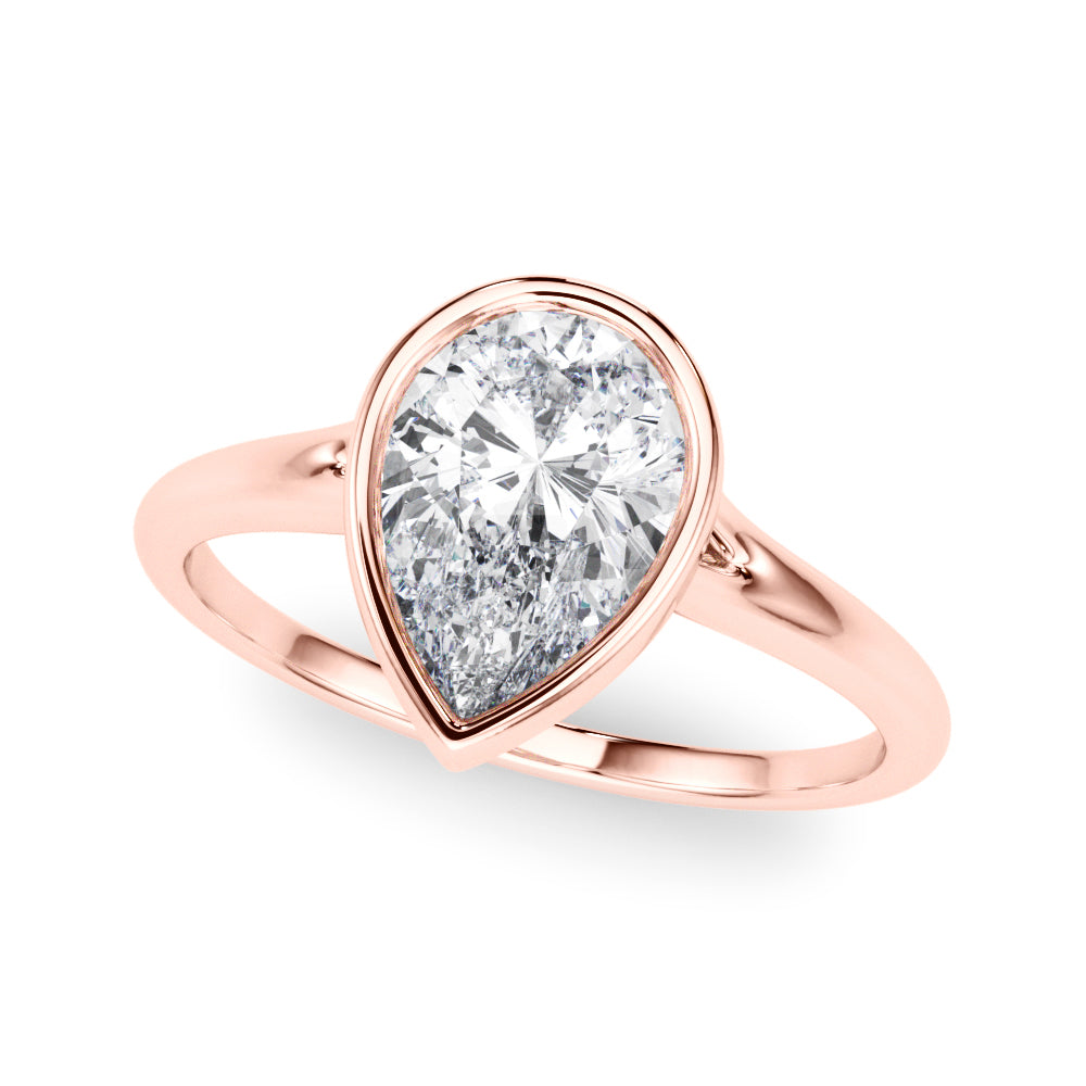 A rose gold ring with an pear-shaped diamond set in a modern bezel setting, displayed against a white background. The ring appears elegant and luxurious.