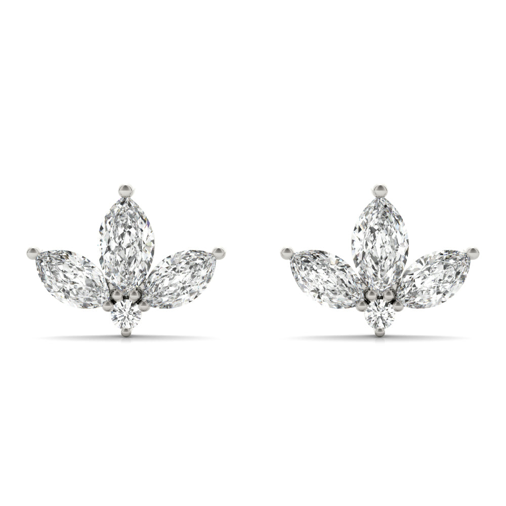 Elegant diamond earrings with a marquise and teardrop cluster design, set in white gold. They convey a sense of luxury and sophistication.