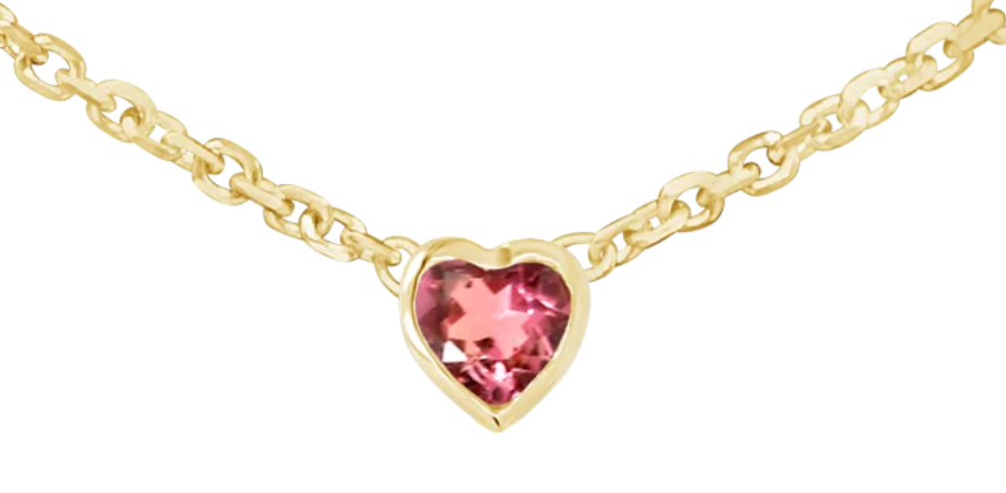 A gold chain necklace featuring a sparkling, heart-shaped pink pendant set in a gold frame, conveying elegance and romance.