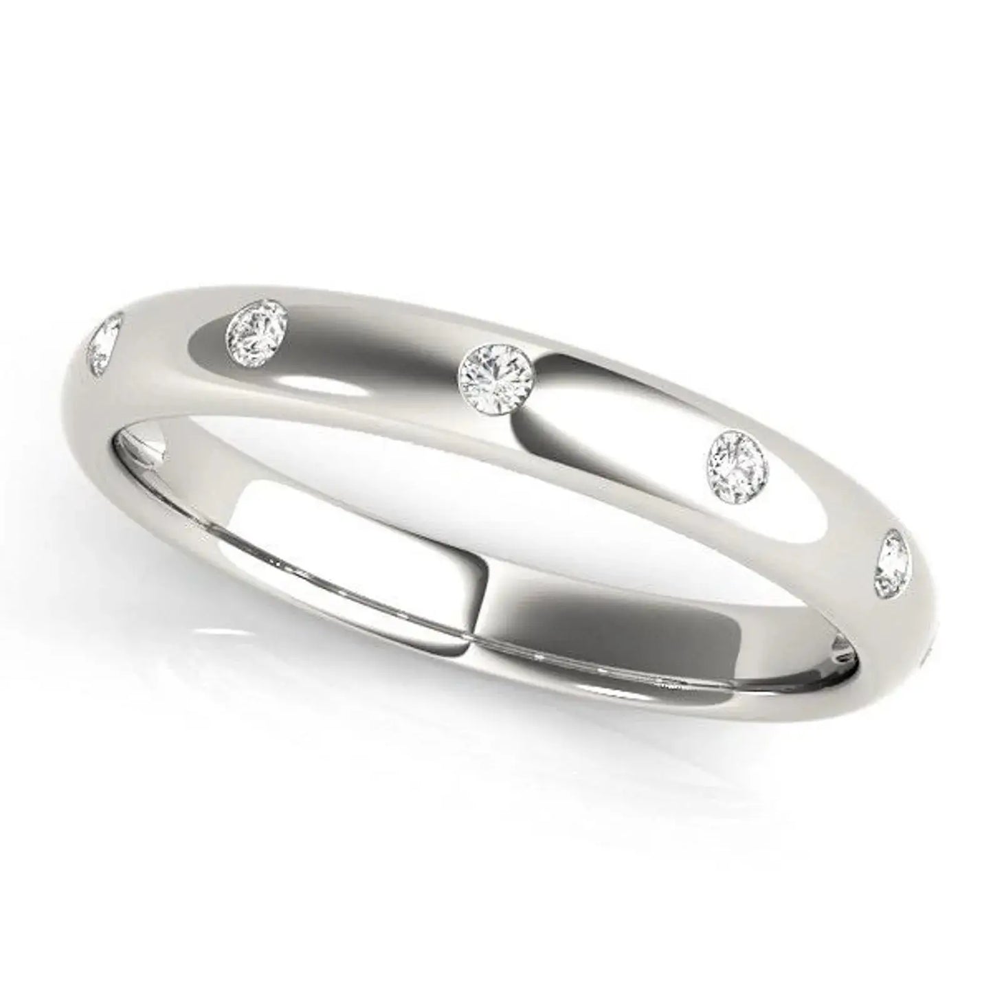 A white gold ring with a sleek design features five evenly spaced small diamonds set along the band. The background is white, emphasizing the ring's elegance.