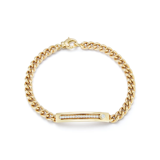 A gold chain bracelet with a rectangular bar featuring a row of small, sparkling crystals. It has a lobster clasp and a polished finish, set against a plain white background.