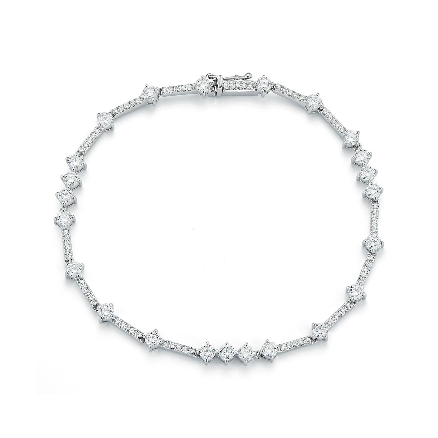 A white gold necklace with alternating diamond clusters pave linked closely in a symmetrical pattern. It conveys elegance and luxury on a plain white background.