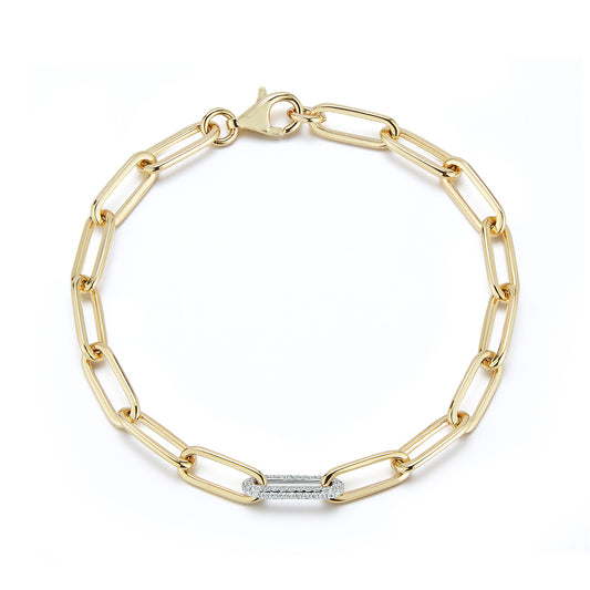 A gold chain bracelet featuring elongated paperclip links and a clasp, set against a white background. It has a rectangular silver accent for contrast.