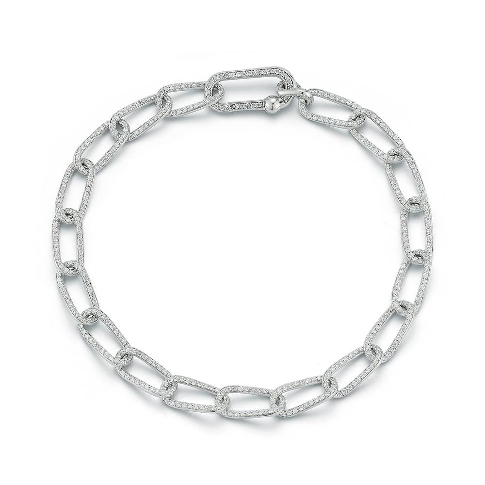 A white gold chain necklace with large, oval links, each adorned with small sparkling diamonds. The design is elegant and luxurious, set against a white background.