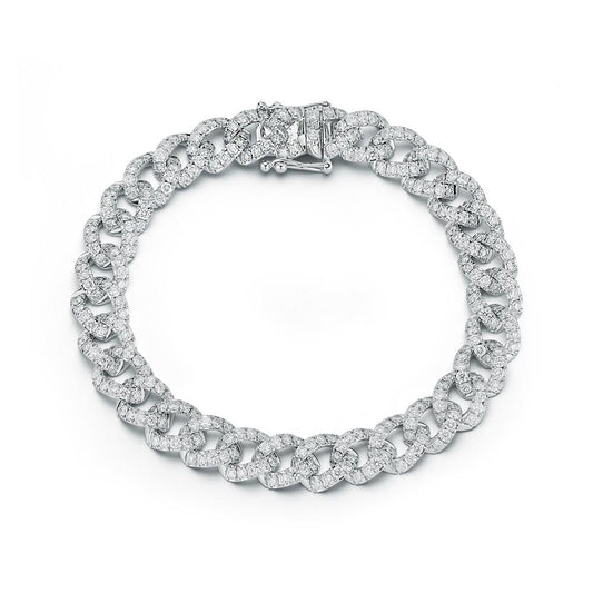 A white gold diamond bracelet with interlocking links, displayed on a white background. The bracelet has a shiny, luxurious appearance, conveying elegance.
