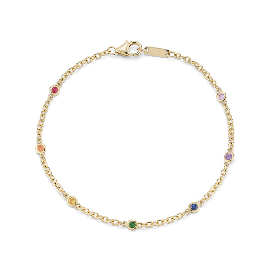 Gold chain bracelet with a lobster clasp, adorned with colorful rainbow gemstones, set against a plain white background. Elegant and minimalist design.